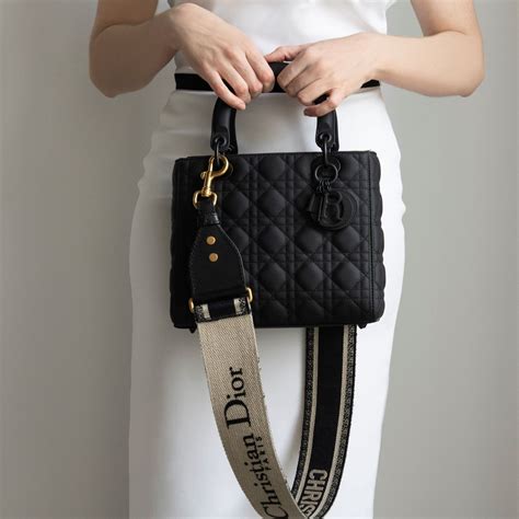 christian dior striped pouch|Christian Dior black small bag.